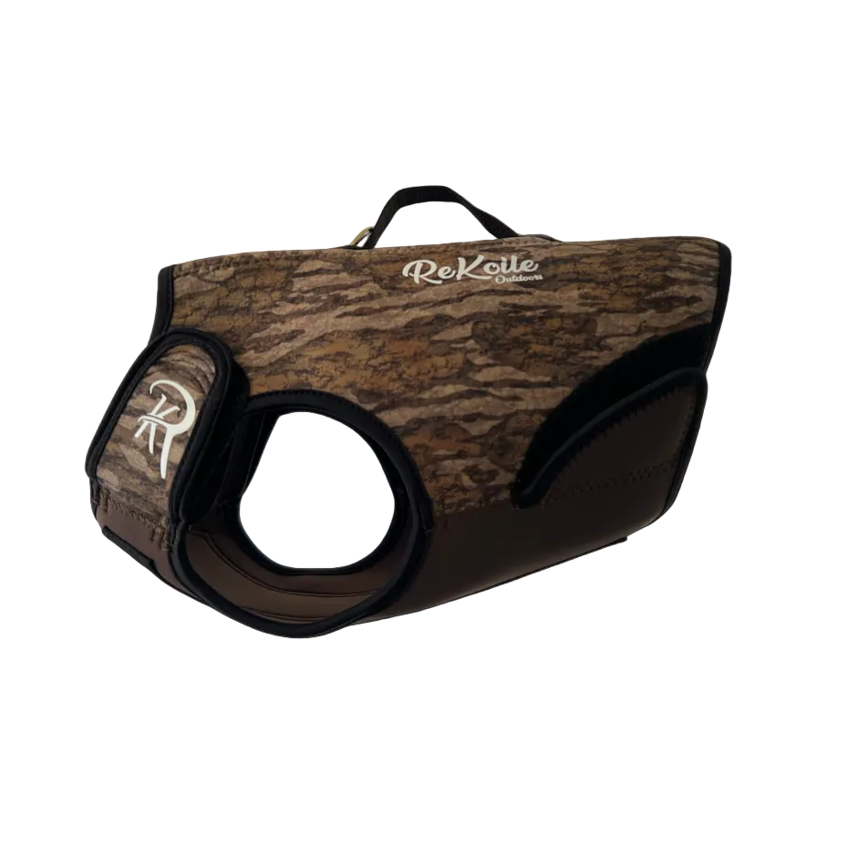 Camo-patterned neoprene dog vest with ReKoile logo on a dark background