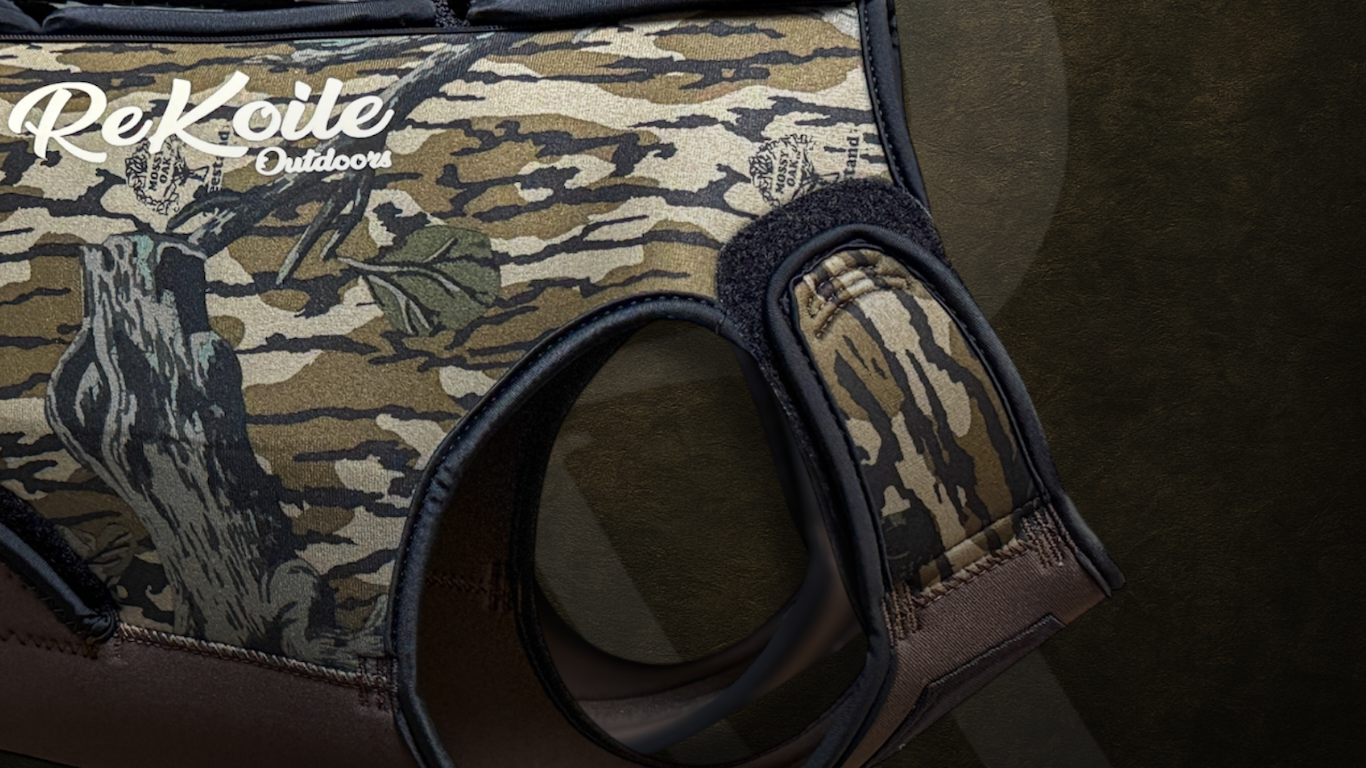 Camouflage-patterned bag with 'ReKoile Outdoors' branding on a dark background