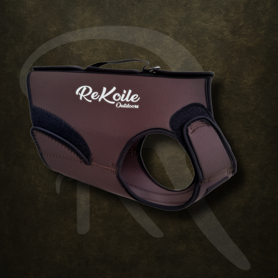 Brown waterfowl dog vest with 'ReKoile Outdoors' branding on a dark background